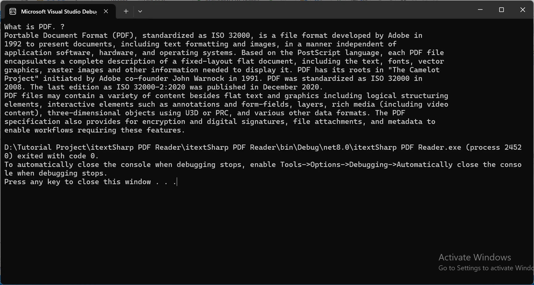 How to Read PDF Documents in C# using iTextSharp:: Figure 3 - Console Output: Extracting the text from the PDF document "What_is_pdf.pdf" using iTextSharp and displaying it as plain text in the console.